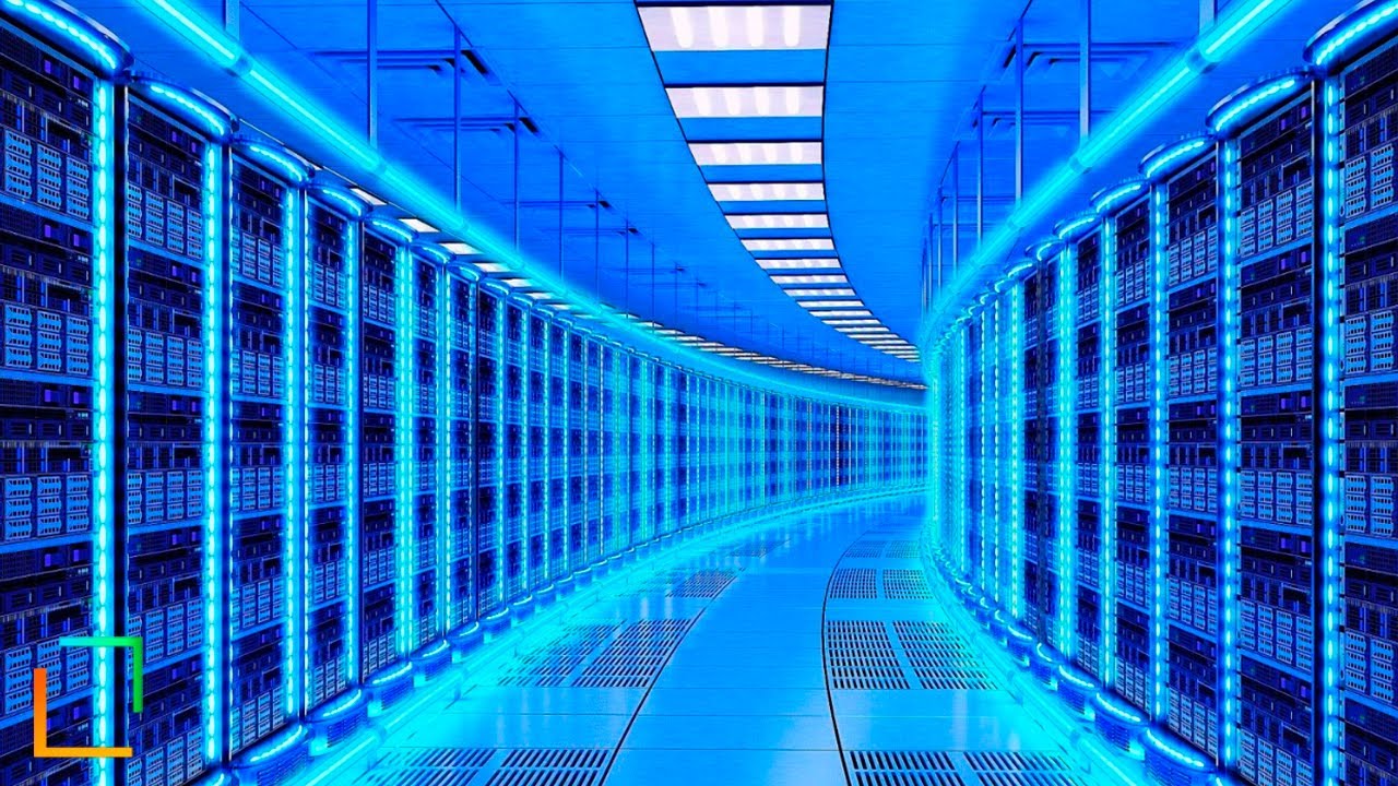 Rows of server racks illuminated in blue